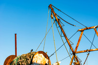 Rusty Fishing Vessel Under Blue Sky